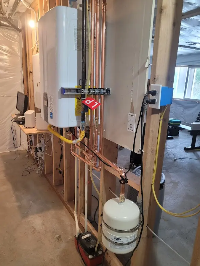 Licensed plumber repairing a kitchen sink in Kermit